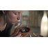 You can see a woman smelling the incense burner, which contains incense charcoal. | © Florian Bauer